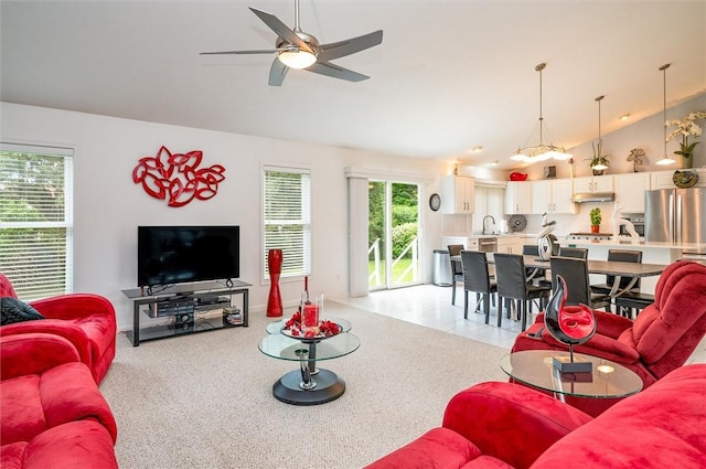 8 Brongo Ln, Gates, NY 14559 - living area with ceiling fan, high vaulted ceiling, and light carpet