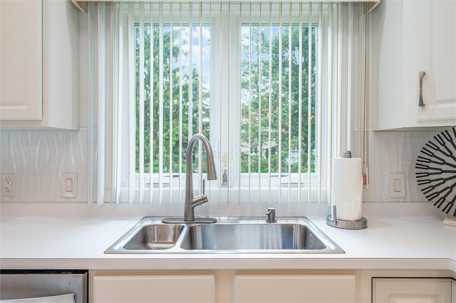8 Brongo Ln, Gates, NY 14559 - kitchen with white cabinets, light countertops, and plenty of natural light