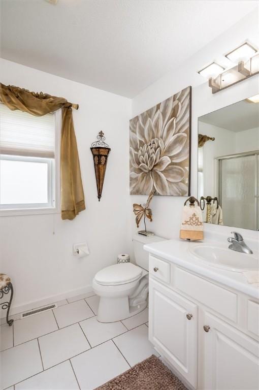 8 Brongo Ln, Gates, NY 14559 - full bathroom with a shower stall, vanity, and tile patterned floors