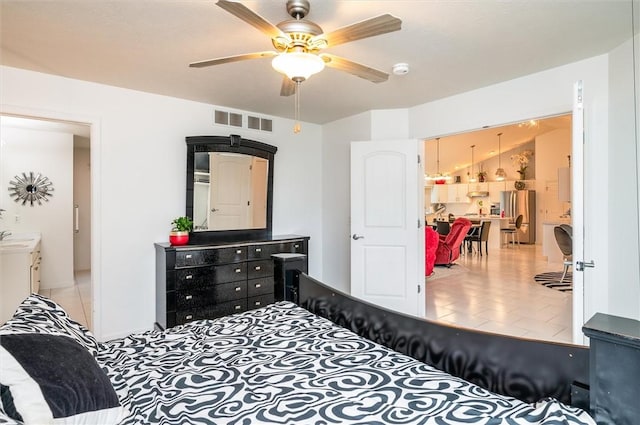 8 Brongo Ln, Gates, NY 14559 - bedroom featuring freestanding refrigerator and a ceiling fan