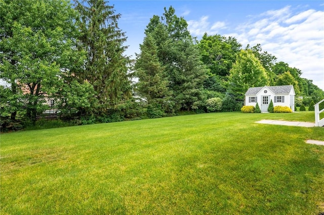 8 Brongo Ln, Gates, NY 14559 - view of grassy yard featuring an outdoor structure