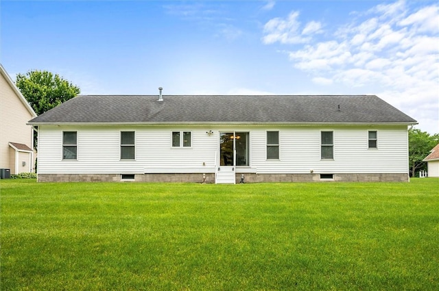 8 Brongo Ln, Gates, NY 14559 - back of property featuring entry steps, a lawn, and roof with shingles