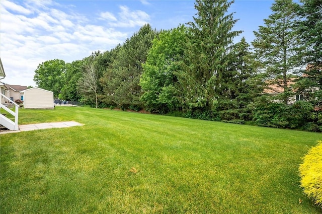 8 Brongo Ln, Gates, NY 14559 - view of green lawn
