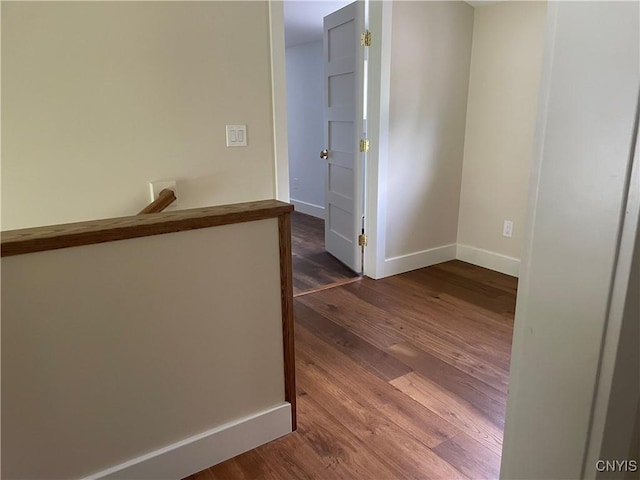 203 E Genesee St, Manlius, NY 13066 - corridor with dark wood-style floors and an upstairs landing