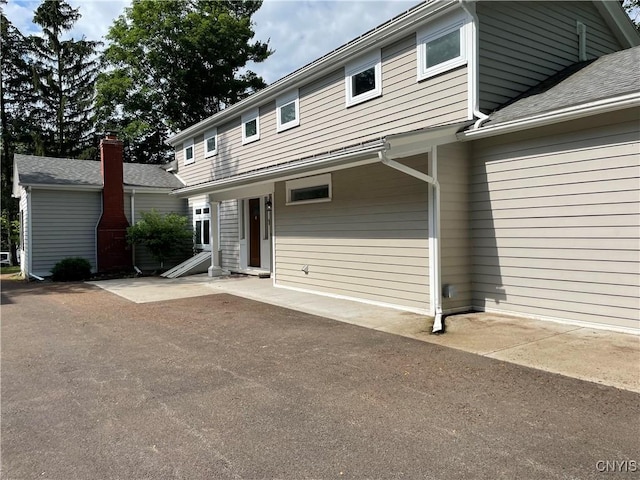 203 E Genesee St, Manlius, NY 13066 - view of front of home featuring a shingled roof