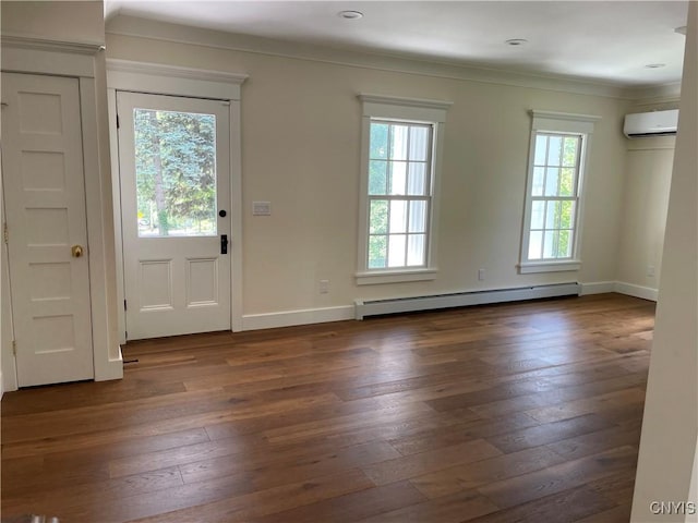 203 E Genesee St, Manlius, NY 13066 - entrance foyer featuring a baseboard heating unit, an AC wall unit, dark wood-style flooring, and crown molding