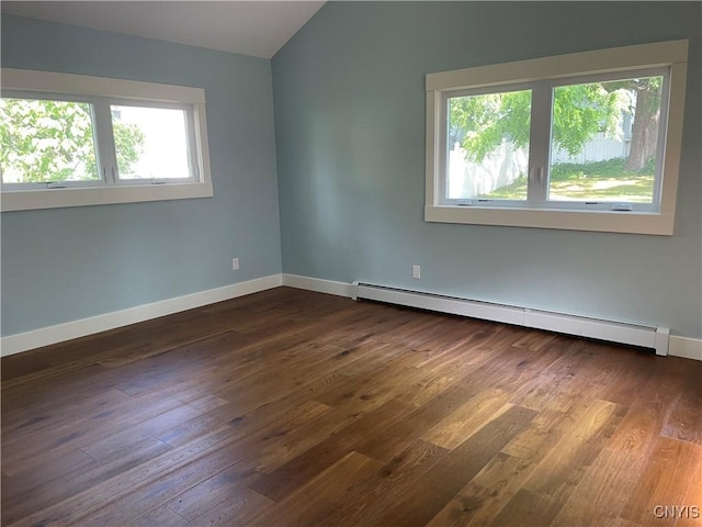 203 E Genesee St, Manlius, NY 13066 - empty room with a baseboard radiator, dark wood-type flooring, and lofted ceiling