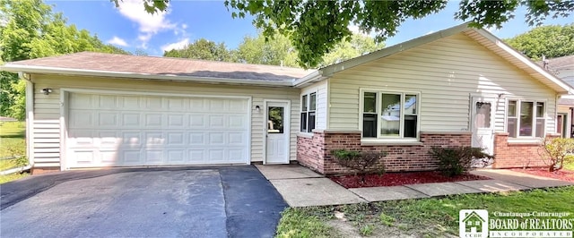 3194 Cranberry Rd, Allegany, NY 14760 - ranch-style home featuring brick siding, asphalt driveway, and a garage