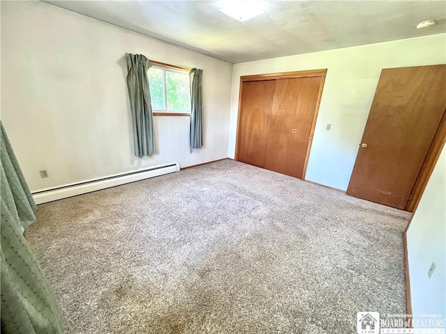 3194 Cranberry Rd, Allegany, NY 14760 - unfurnished bedroom with a baseboard heating unit, carpet flooring, and a closet