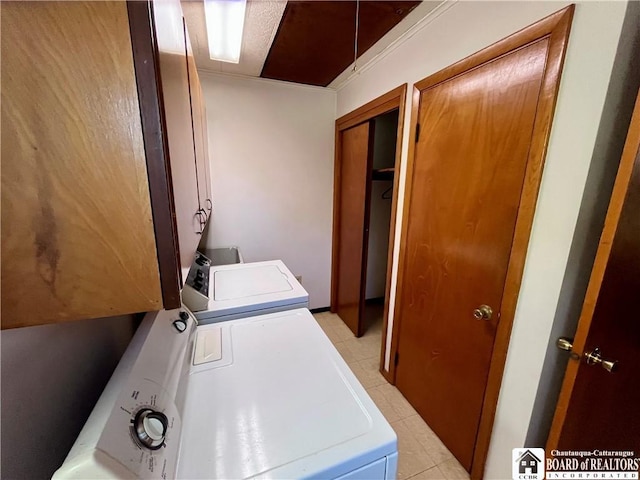 3194 Cranberry Rd, Allegany, NY 14760 - laundry room featuring independent washer and dryer, cabinet space, and light tile patterned flooring