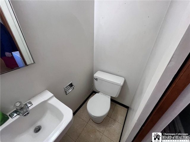 3194 Cranberry Rd, Allegany, NY 14760 - bathroom with a sink and tile patterned floors