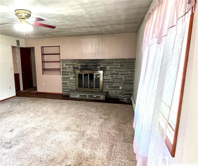 3194 Cranberry Rd, Allegany, NY 14760 - unfurnished living room featuring a fireplace, ceiling fan, and carpet
