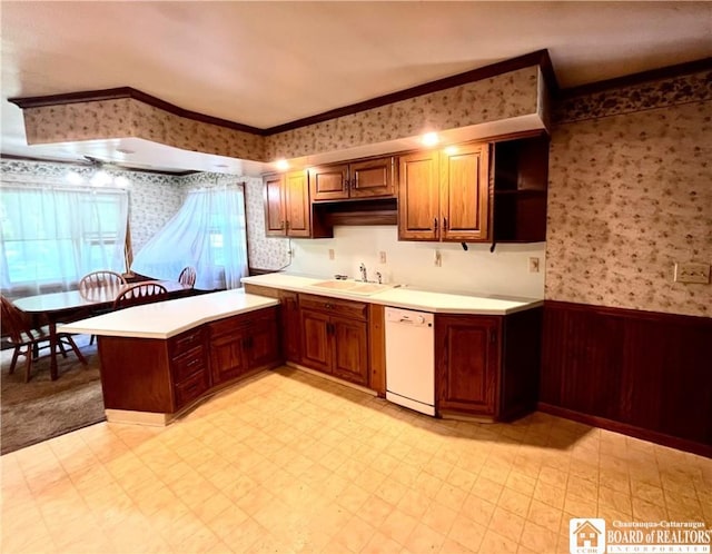 3194 Cranberry Rd, Allegany, NY 14760 - kitchen with wallpapered walls, dishwasher, a peninsula, light flooring, and crown molding