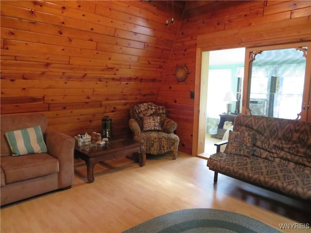 8211 Elmwood Dr, Rushford, NY 14717 - living area with wood walls, wood finished floors, and cooling unit