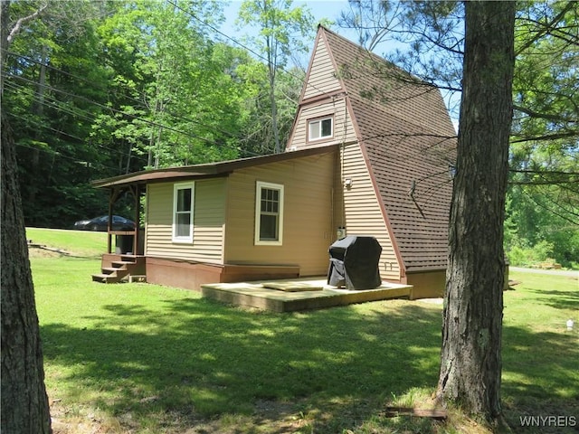 8211 Elmwood Dr, Rushford, NY 14717 - view of side of property with a yard