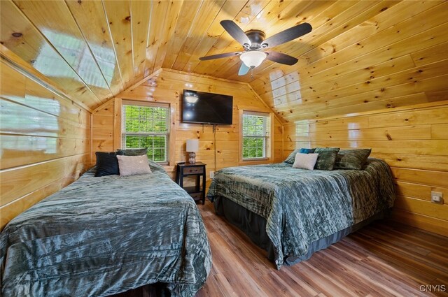 224 Macarthur Rd, Russia, NY 13324 - bedroom featuring multiple windows, wooden walls, wood finished floors, wood ceiling, and lofted ceiling