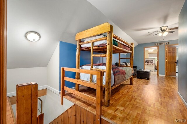 224 Macarthur Rd, Russia, NY 13324 - bedroom featuring vaulted ceiling and wood finished floors