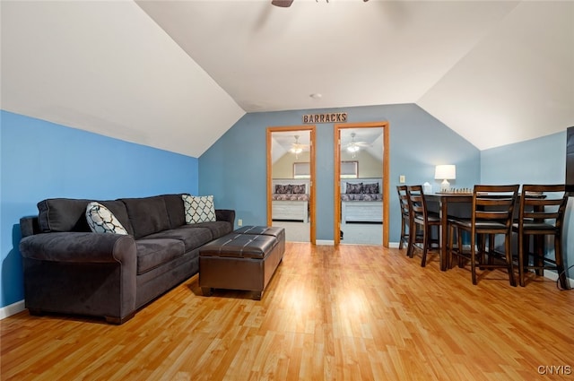 224 Macarthur Rd, Russia, NY 13324 - living room with ceiling fan, wood finished floors, and lofted ceiling