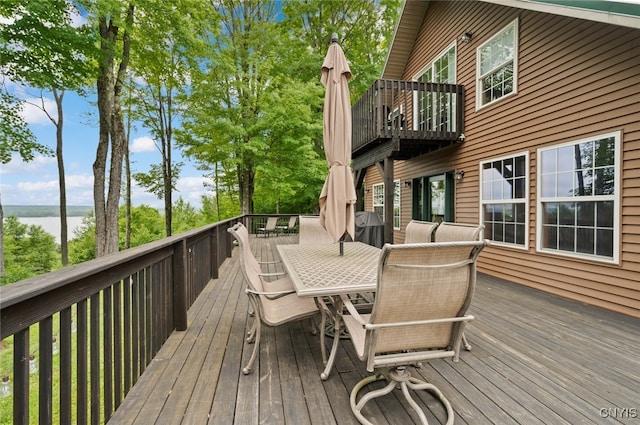 224 Macarthur Rd, Russia, NY 13324 - wooden deck featuring outdoor dining area and a water view