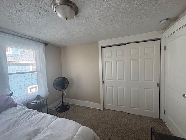 166 Burwell Rd, Irondequoit, NY 14617 - carpeted bedroom with a closet and a textured ceiling