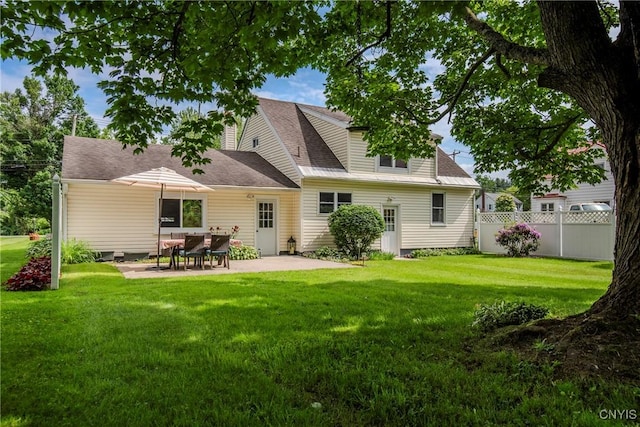 6954 Rome Oriskany Rd, Rome, NY 13440 - back of property featuring a patio area and a shingled roof