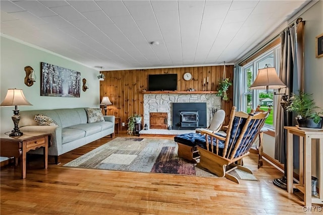 6954 Rome Oriskany Rd, Rome, NY 13440 - living room featuring wood finished floors, wood walls, and crown molding