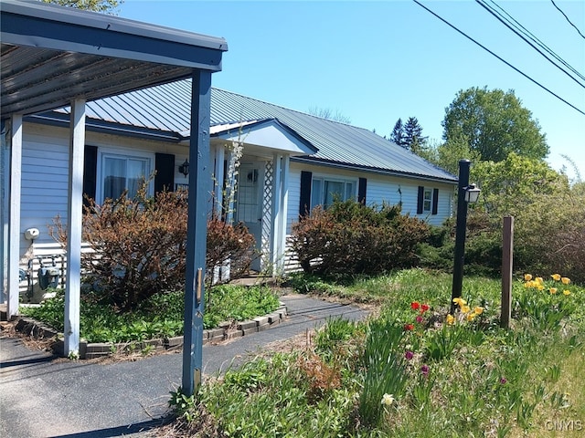 12324 US Route 11, Adams, NY 13606 - view of front of house with a metal roof