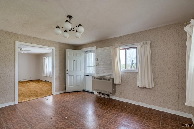 12324 US Route 11, Adams, NY 13606 - unfurnished dining area featuring heating unit, tile patterned floors, wallpapered walls, and a chandelier