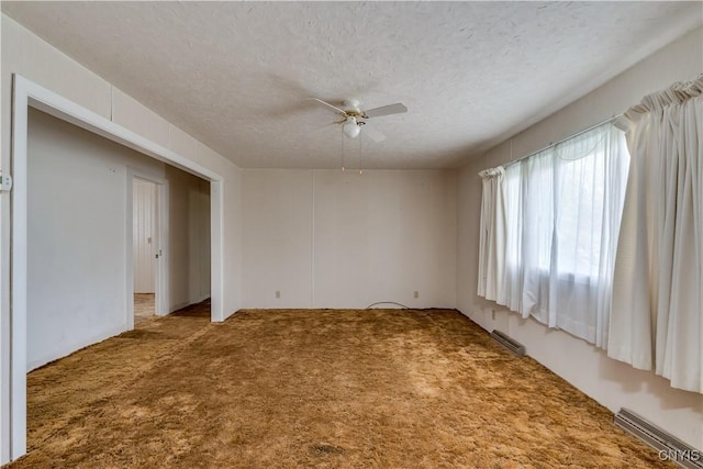 12324 US Route 11, Adams, NY 13606 - empty room featuring carpet flooring, ceiling fan, and a textured ceiling