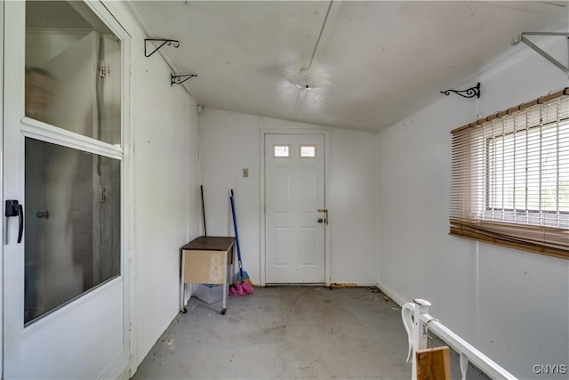 12324 US Route 11, Adams, NY 13606 - foyer featuring lofted ceiling, concrete flooring, and plenty of natural light