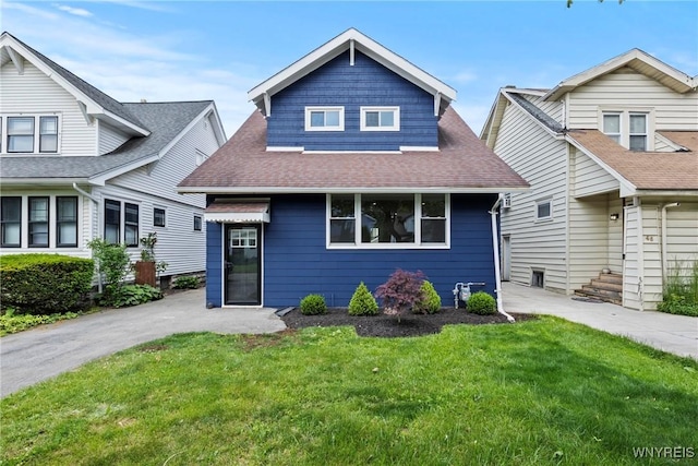 42 Frontenac Ave, Buffalo, NY 14216 - view of front facade featuring a front yard and a shingled roof