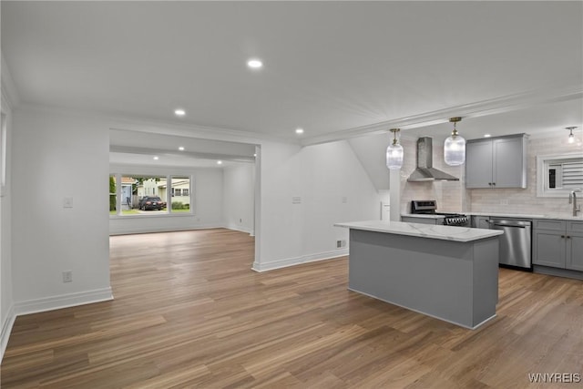 42 Frontenac Ave, Buffalo, NY 14216 - kitchen featuring appliances with stainless steel finishes, gray cabinets, open floor plan, a center island, and wall chimney exhaust hood