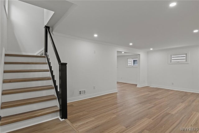 42 Frontenac Ave, Buffalo, NY 14216 - below grade area with stairs, recessed lighting, light wood-type flooring, and ornamental molding
