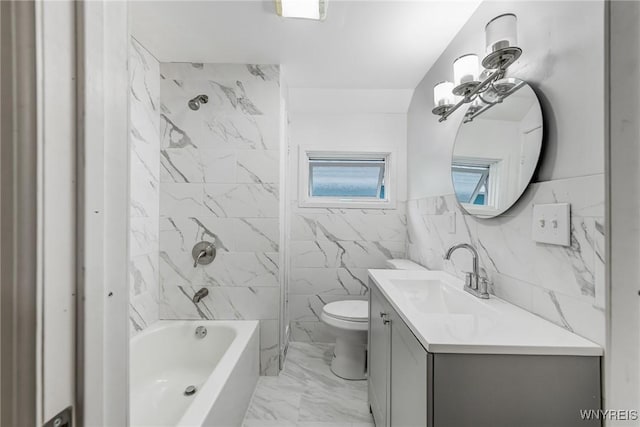 18 Wade Ave, Buffalo, NY 14214 - bathroom with marble finish flooring, vanity, bathtub / shower combination, tile walls, and a chandelier