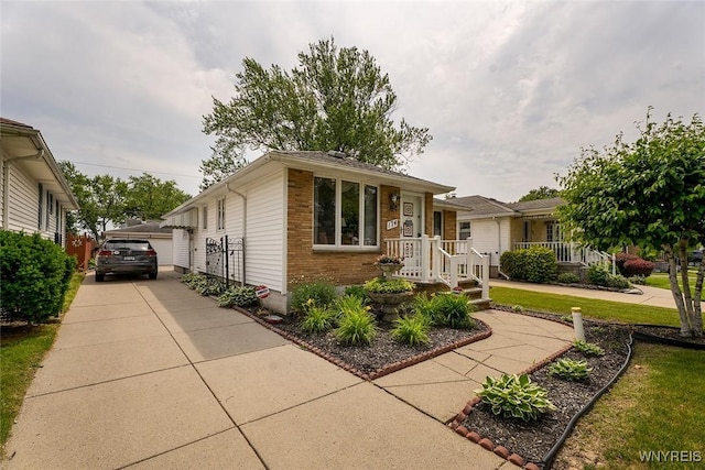 174 Homewood Ave, Tonawanda, NY 14217 - view of front of home featuring brick siding and a detached garage