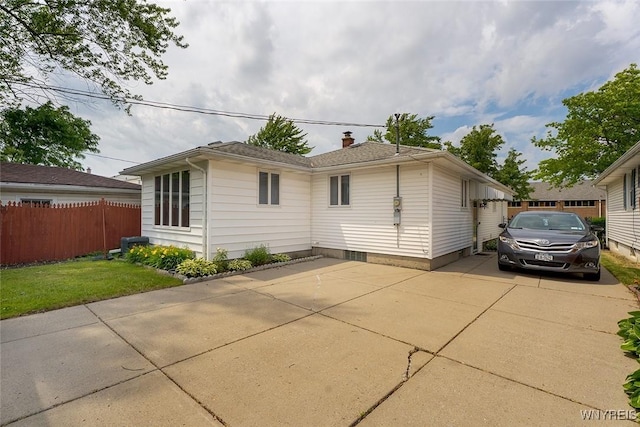 174 Homewood Ave, Tonawanda, NY 14217 - view of side of property featuring a chimney