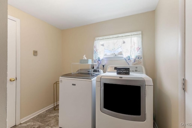 7772 New Hope W, Clay, NY 13090 - washroom with washer and clothes dryer and baseboards