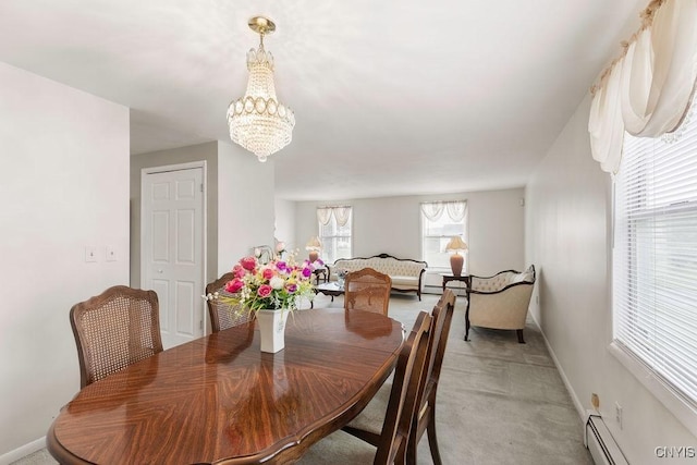 7772 New Hope W, Clay, NY 13090 - dining space with a chandelier, baseboard heating, and light colored carpet