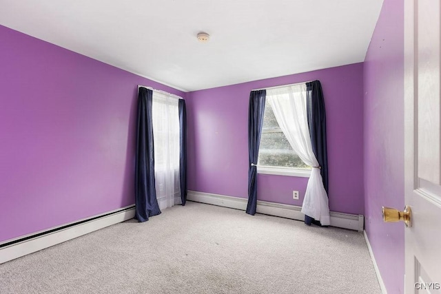 7772 New Hope W, Clay, NY 13090 - spare room with carpet, a baseboard heating unit, a smoke detector, and healthy amount of natural light
