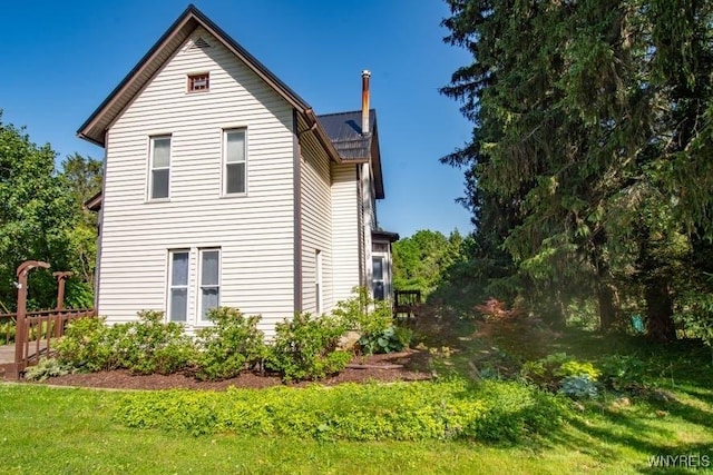 45 S Academy St, Middlebury, NY 14591 - view of home's exterior with a metal roof