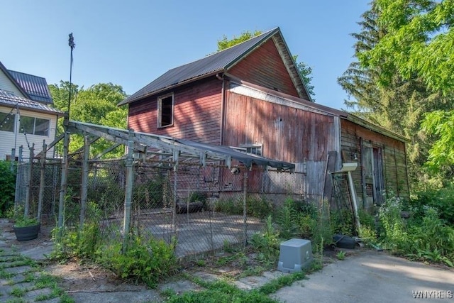 45 S Academy St, Middlebury, NY 14591 - view of side of property with a metal roof