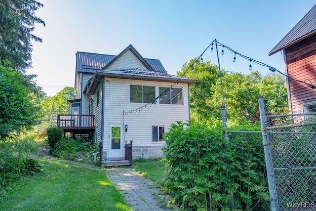 45 S Academy St, Middlebury, NY 14591 - view of side of property featuring a metal roof and a deck