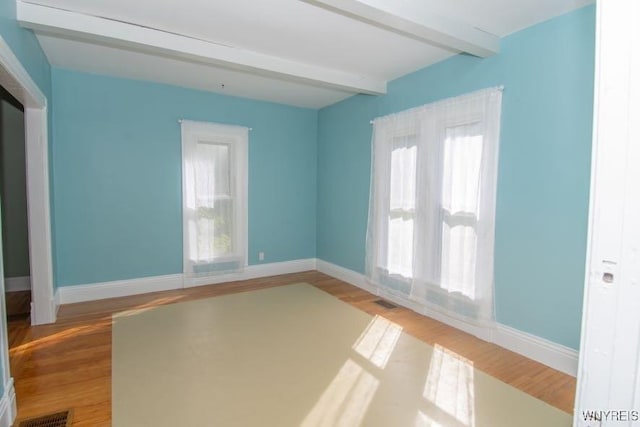 45 S Academy St, Middlebury, NY 14591 - spare room with beam ceiling and wood finished floors