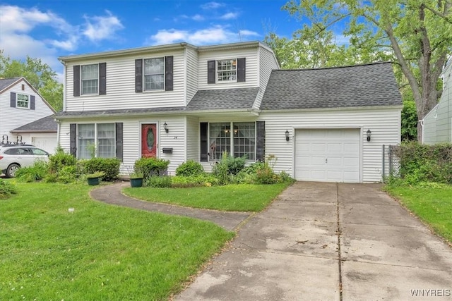 34 Northfield Pl, Amherst, NY 14226 - traditional-style house featuring a garage, a front lawn, and concrete driveway