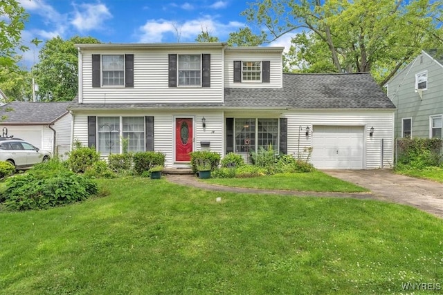 34 Northfield Pl, Amherst, NY 14226 - traditional-style house featuring a garage, a front yard, and driveway