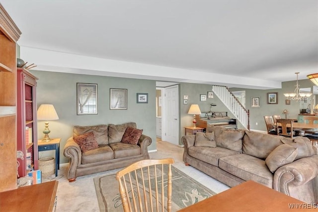 34 Northfield Pl, Amherst, NY 14226 - carpeted living room with a chandelier and baseboards