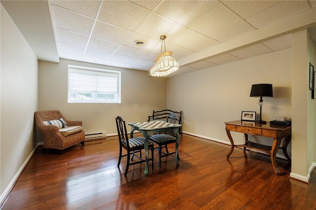 31 Spruce Rdg, Perinton, NY 14450 - dining room featuring a baseboard radiator, hardwood / wood-style flooring, and a drop ceiling