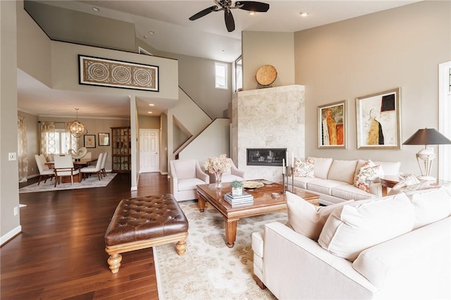 31 Spruce Rdg, Perinton, NY 14450 - living area featuring high vaulted ceiling, a ceiling fan, wood finished floors, stairs, and recessed lighting