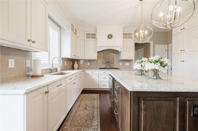 31 Spruce Rdg, Perinton, NY 14450 - kitchen featuring a chandelier, white cabinets, dark wood-type flooring, and a center island