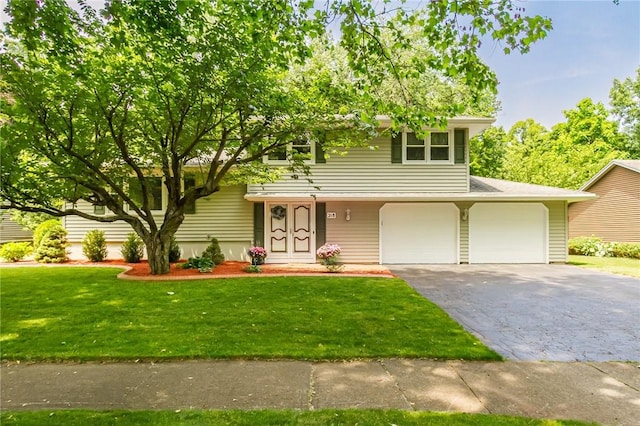 218 Fox Hall Dr, Irondequoit, NY 14609 - view of front of home with a front lawn, driveway, and a garage